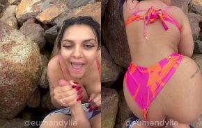 Mandy Lia fazendo boquete e dando a buceta de quatro nas pedras da praia